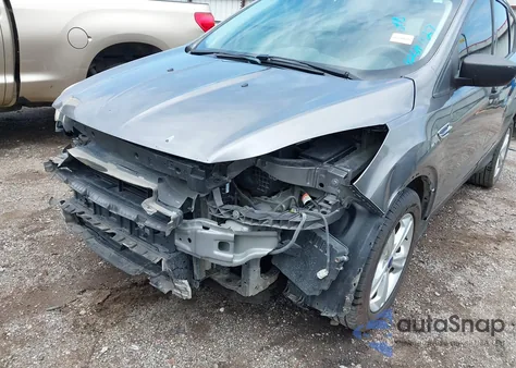 2014 Ford Escape S z USA, uszkodzony, nr VIN 1FMCU0F72EUE12356